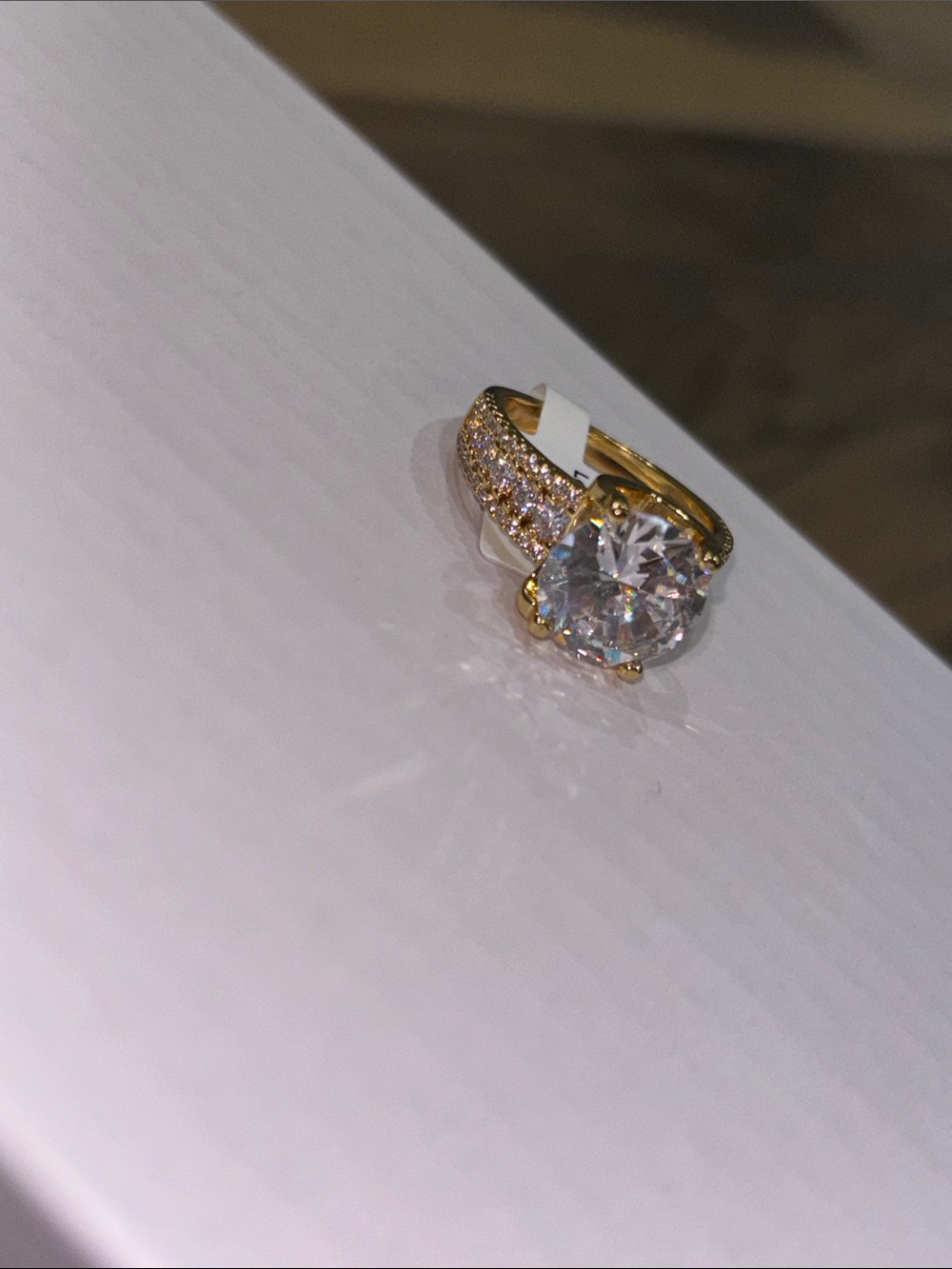 Gold-Tone Pavé Cubic Zirconia Engagement Ring with Clear Center Stone